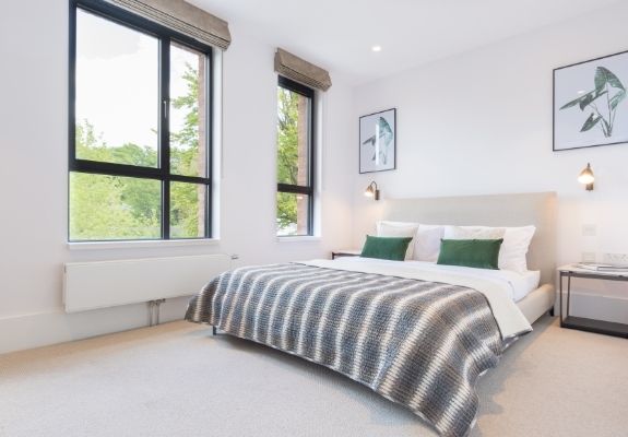 steel look sliding glass doors with glazing bars and gable end windows and rooflights