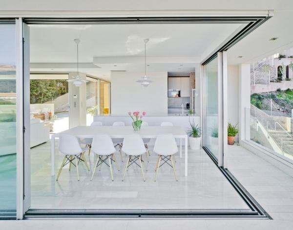 luxury holiday villa - slim sliding glass doors - minimal glass doors in sea view villa