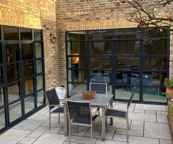 black framed sieger legacy steel look glazing systems in a home renovation