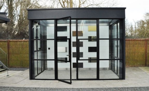 legacy box at the sieger showroom with a steel look casement door and industrial style windows