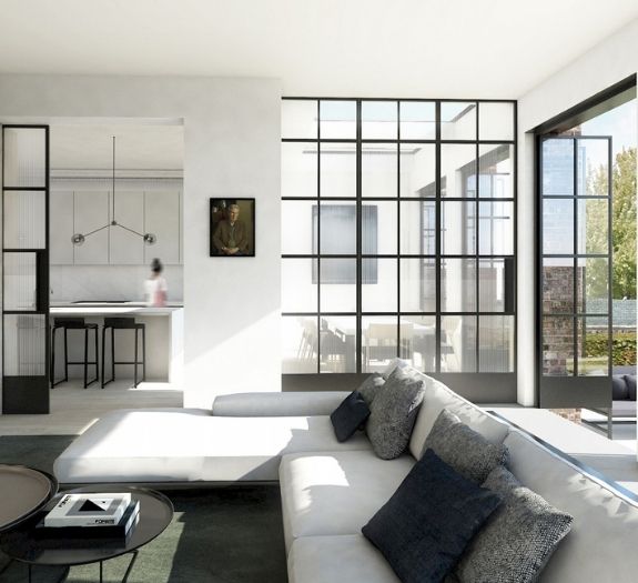 industrial style home with a minimal design and large windows and glazing elevation with glazing bars to suit the traditional industrial aesthetic 