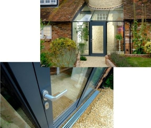 schuco aluminium casement door and Invisio structural glazing including glass roof with a lever handle and euro cylinder key lock