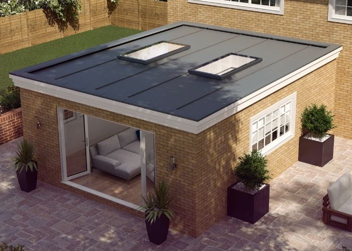 two flat fixed rooflights on a modern home extension to increase natural light two flat fixed rooflights on a modern home extension to increase natural light