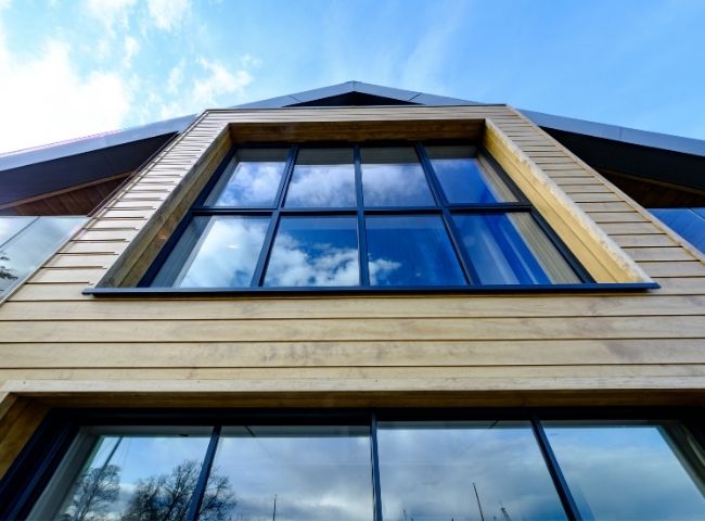 slim framed aluminium casement windows in a luxury waterfront residential development in a coastal conservation area