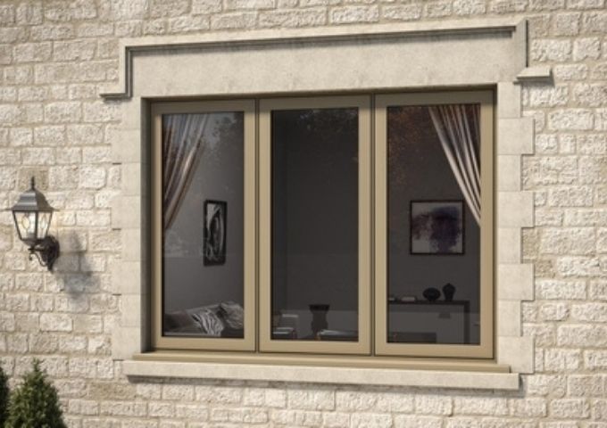 gold framed three pane aluminium casement window with flush design