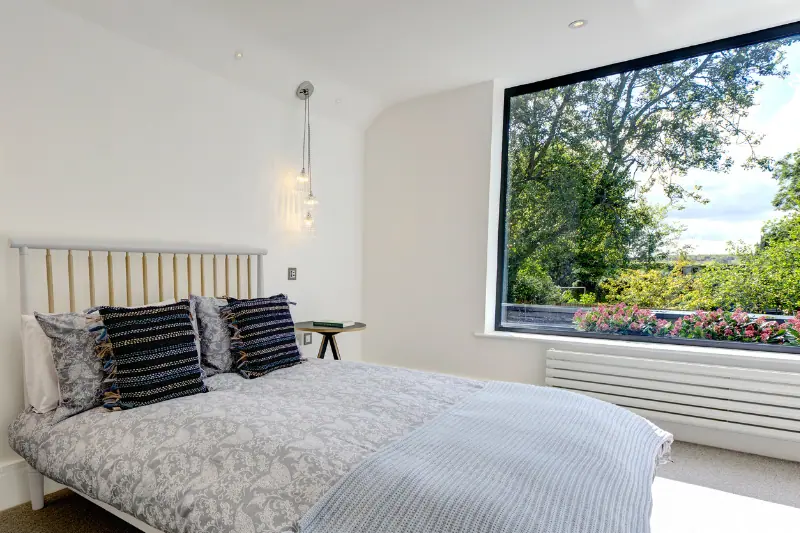 large bedroom window with slim aluminium framing