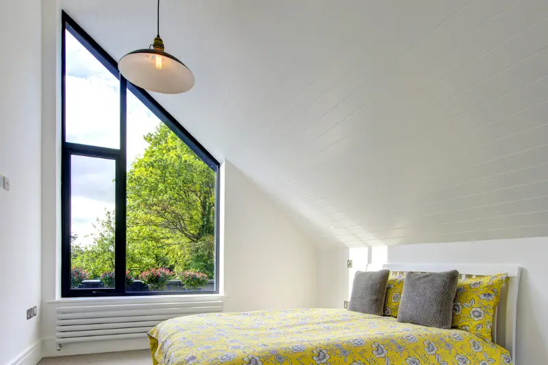 multilight slim casement window configuration with fixed gable end windows