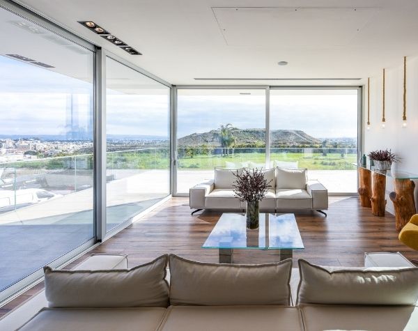 open corner sieger slim sliding glass doors in a luxury Greek villa