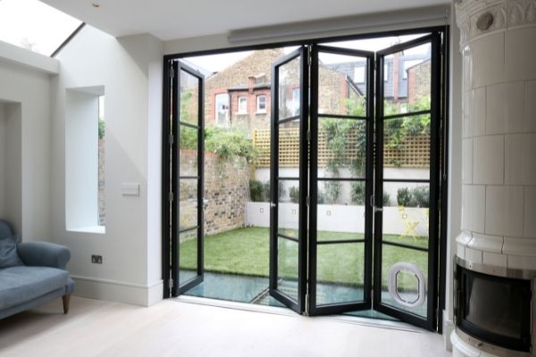 sieger legacy bifold door with applied glazing bars for an industrial style glazing system