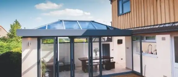 Sieger 40 aluminum lantern rooflight and aluminium bifold door in a modern home extension