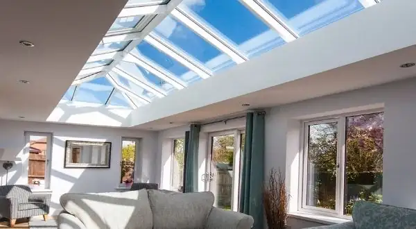 large lantern rooflight with white aluminium framing in a contemporary home extension