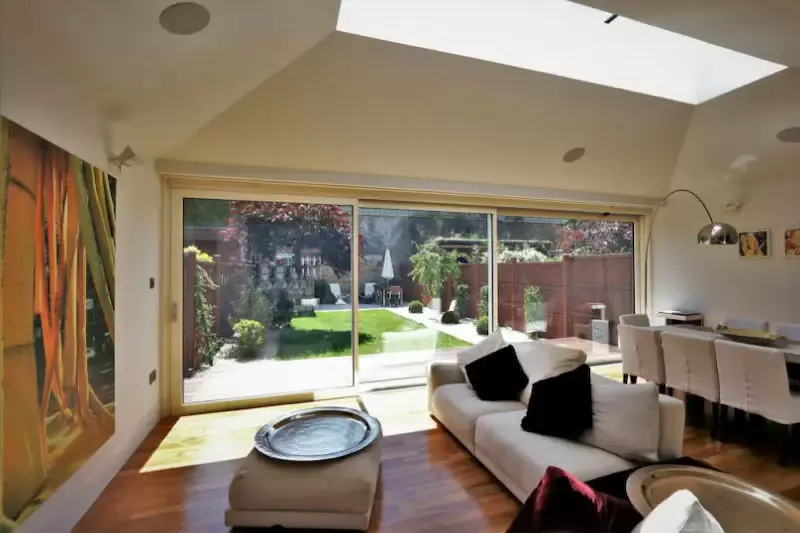 sliding glass patio door with thermally broken white aluminium framing