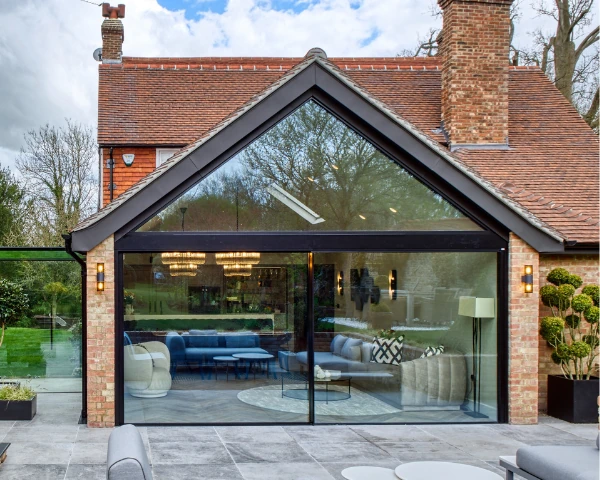 mount house oversized glazing with large gable end window used to make a statement in this home renovation