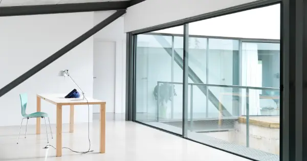 oversized triple glazed sliding glass door with slim aluminium framing from Sieger