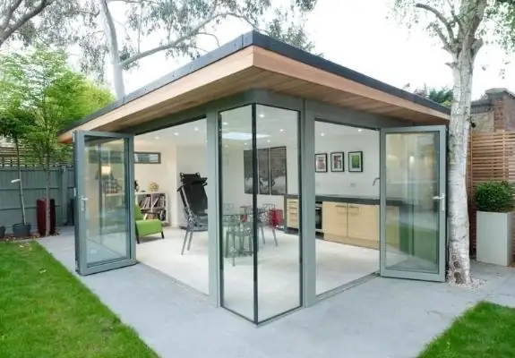 contemporary garden room with two slim aluminium bifold doors