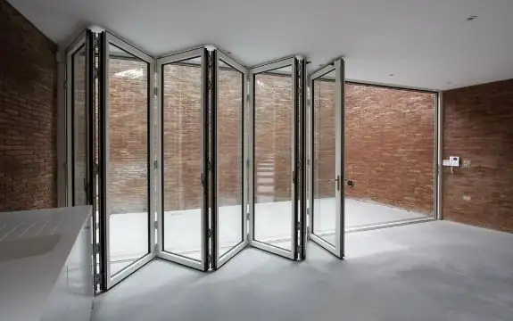 seven pane slim framed bifold door with white aluminium framing